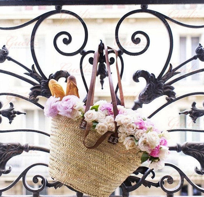 Straw shopping tote with leather handles