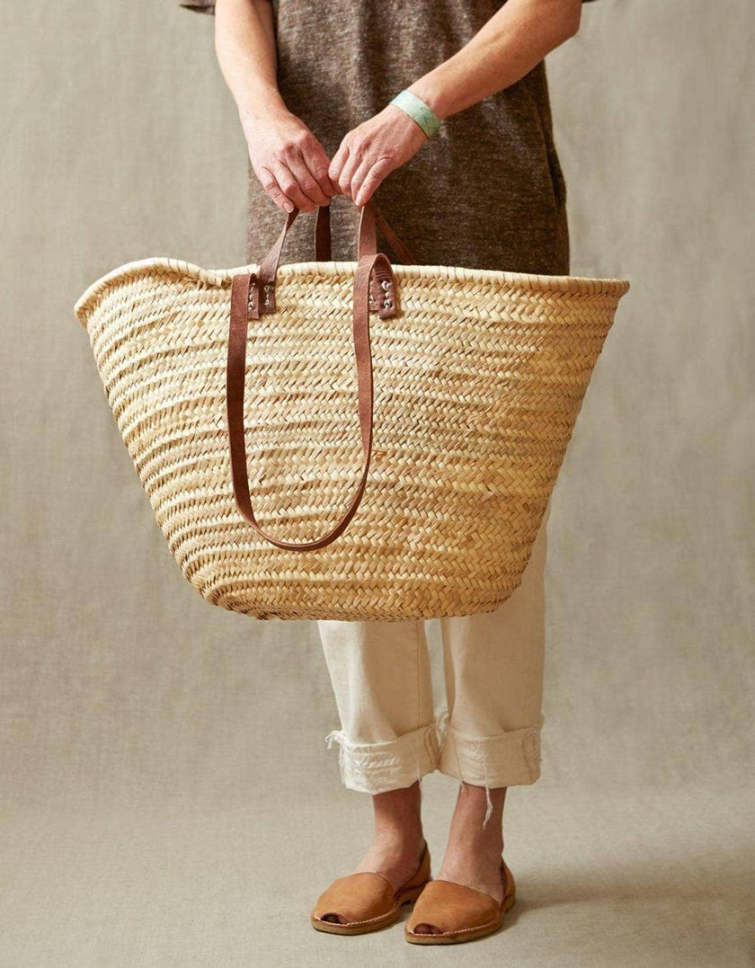 Straw shopping tote with leather handles