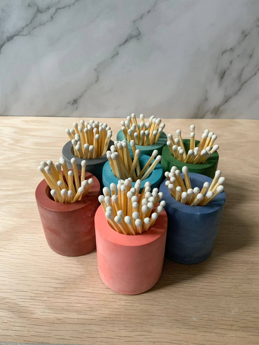 Concrete match stick holder
